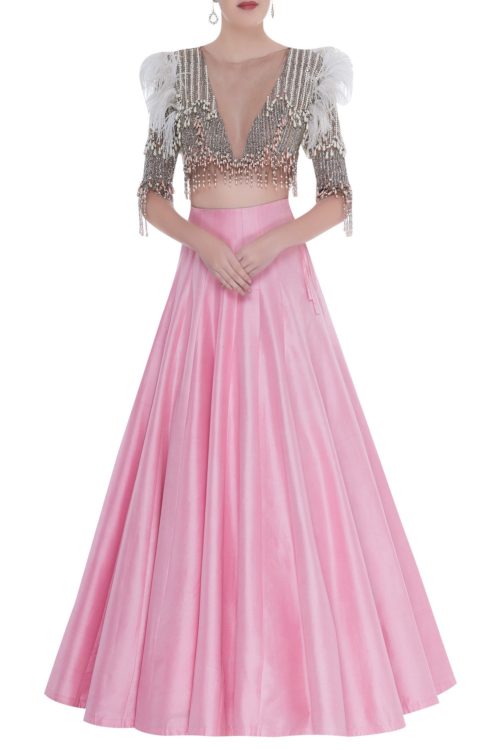 View more Pink lehenga Pink lehenga with a grey blouse