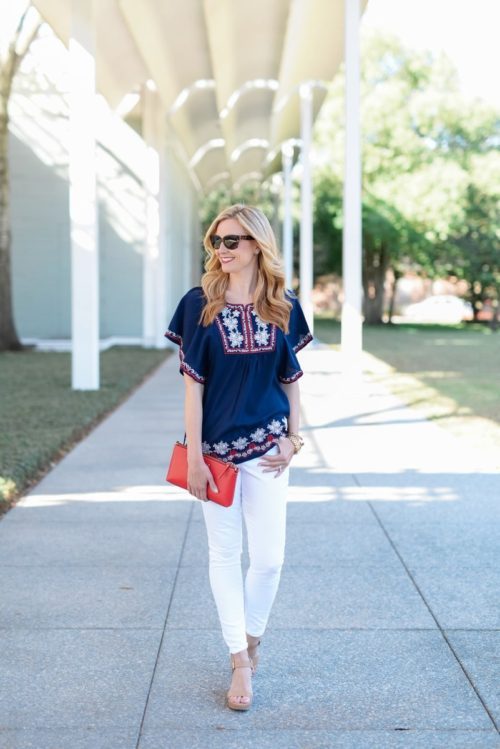 blue top and white jeans