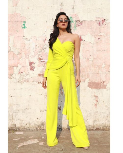 green jumpsuit of kiara, kiara in lime green jumpsuit,