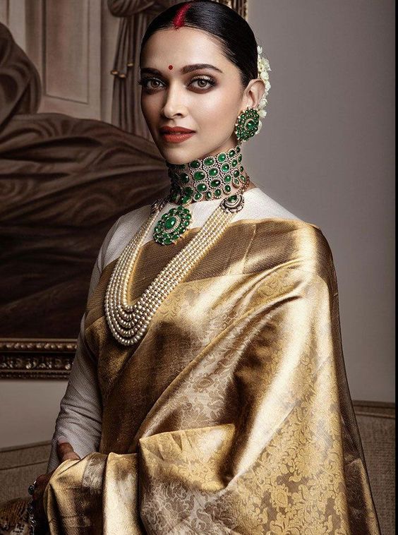 deepika padukone in gold silk sari