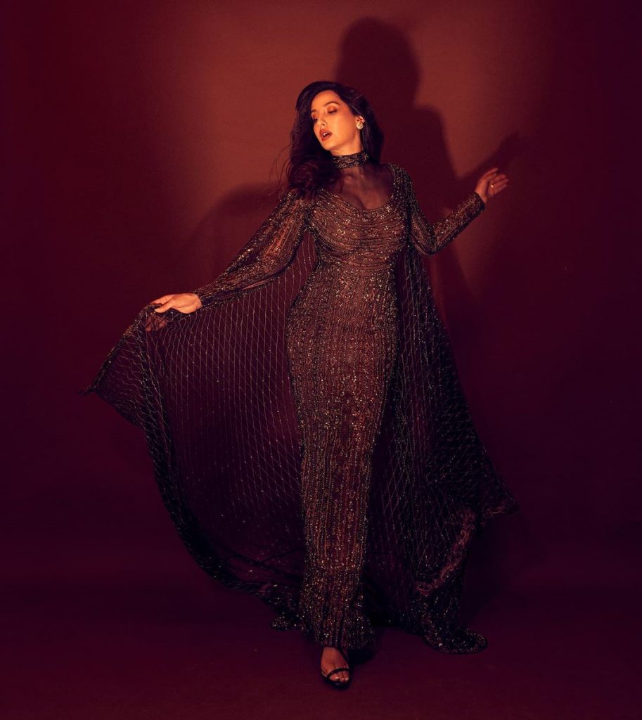 Nora in dark copper gown