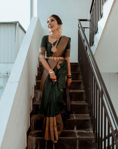 South Indian bride in Kasavu saree