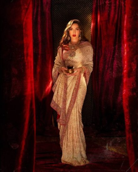 Nora Fatehi in biege designer saree