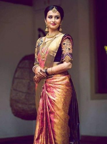 South Indian bride in pink Pattu saree