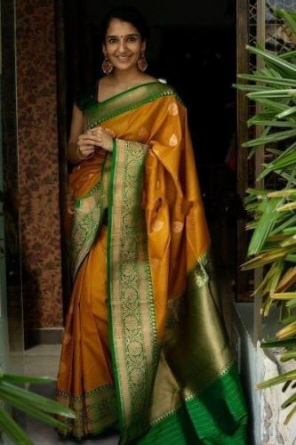 South Indian bride in mustard Kanjivaram saree