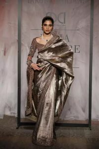 All over Metallic Clothing as dominance