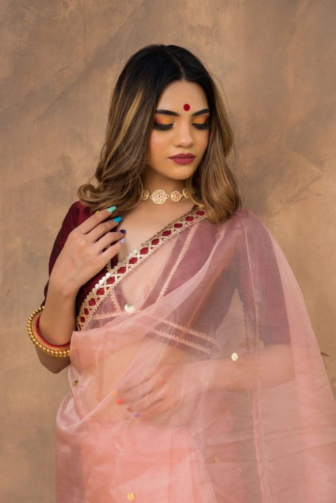 Peach Fuzz Sarees in Trending style