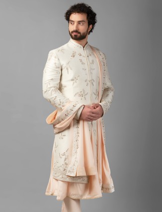 Stunning raw silk cream sherwani for groom