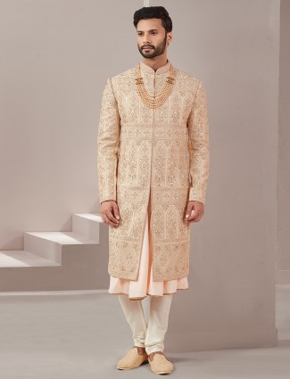 Peach stunning raw silk sherwani for groom
