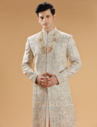 Premium light peach raw silk groom sherwani