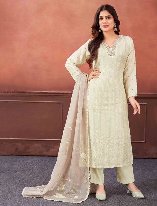 Off-white silk salwar suit with floral dupatta