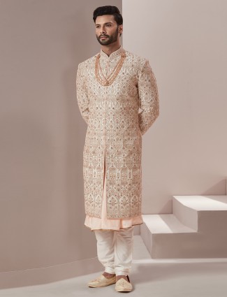 Fabulous peach raw silk groom wear sherwani
