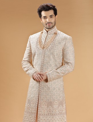 Peach raw silk lavish groom sherwani