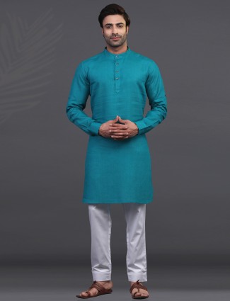 Green linen kurta suit for festive occasion