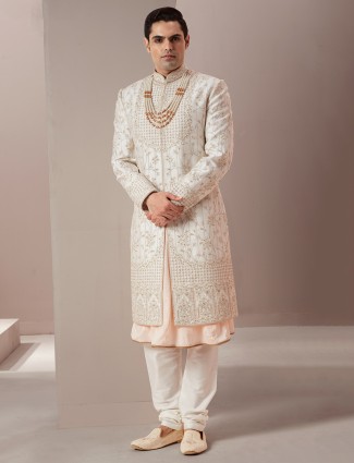 Cream raw silk wedding sherwani for groom