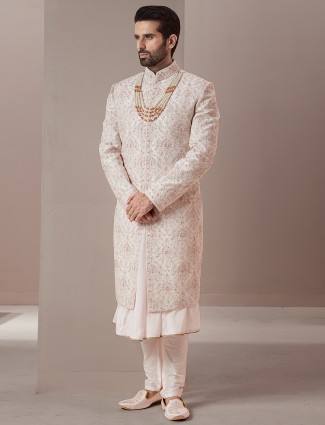 Groom and wedding look light pink raw silk sherwani