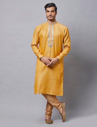 Mustard yellow silk kurta suit for festive look
