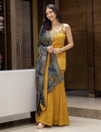 Gold silk zari worked palazzo suit with for haldi celebration