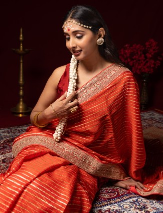 Attractive orange georgette saree for woman