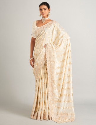 Fascinating  cream silk festive wear saree