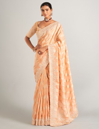 Peach zari worked silk saree with unstitched blouse