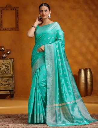 Aqua silk saree with silver woven details