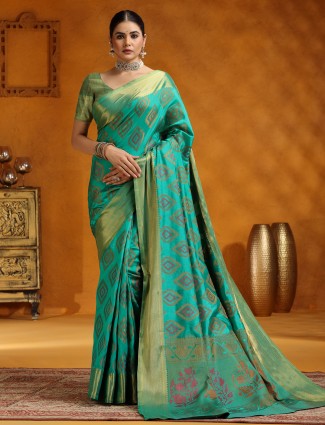 Golden radiance tissue silk saree with royal embellishments
