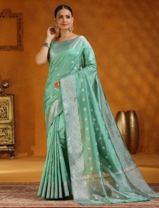 Golden radiance tissue silk saree with royal embellishments
