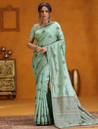 Mint green silk saree with elegant zari weaving