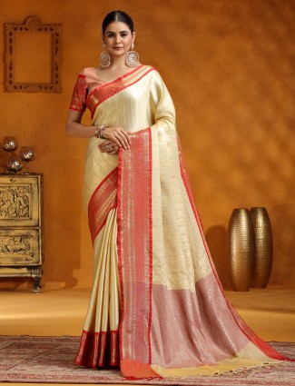 Golden radiance tissue silk saree with royal embellishments