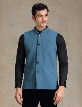 Solid rama blue textured waistcoat in jute