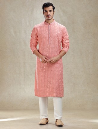 Graceful peach textured kurta and pajama ensemble