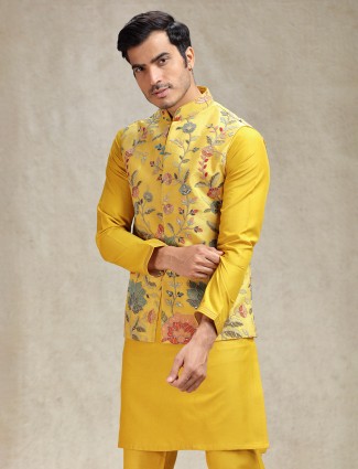 Vibrant yellow floral waistcoat set for a joyful haldi ceremony