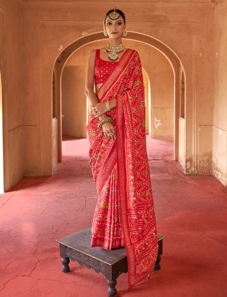 Red printed patola silk saree with unstitched blouse piece