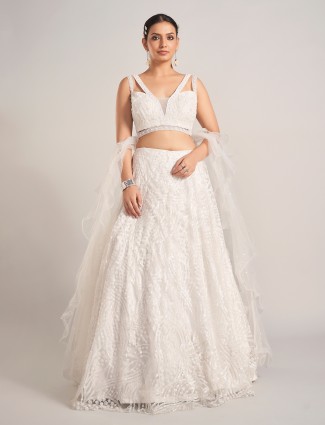 White net lehenga choli with ruffle dupatta for reception