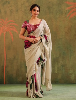 Beige crepe georgette saree with sequin embellishments