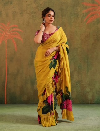 Yellow crepe georgette saree with beaded blouse