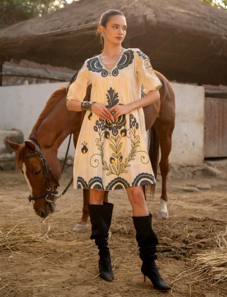 Cream cotton silk kurti with keyhole work in yoke pattern