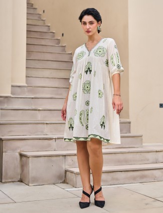 Elegant off white cotton kurti with embroidery detail