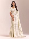 Cream silk saree enhanced with elegant zari detailing