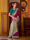 Purple silk saree with regal zari border