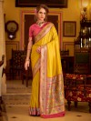 Yellow silk saree with traditional zari edging