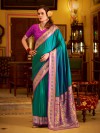 Teal blue silk saree with classic woven border