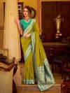 Mehendi green silk saree with heritage zari border