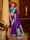 Blue silk saree with ornate zari border