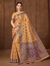 Radiant mustard silk saree with meena artistry