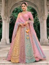 Multicolor silk wedding lehenga choli with artistic work