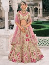 Cream silk wedding lehenga choli with graceful embellishments