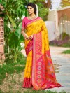 Yellow silk saree with striking border and pallu
