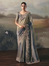 Grey shaded tissue silk saree with modern silken depth